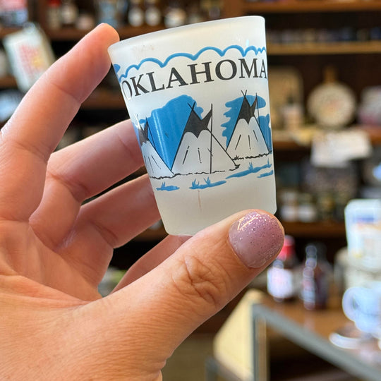 Frosted Oklahoma shot glass with buffalo and teepee art in black and blue – cultural souvenir gift