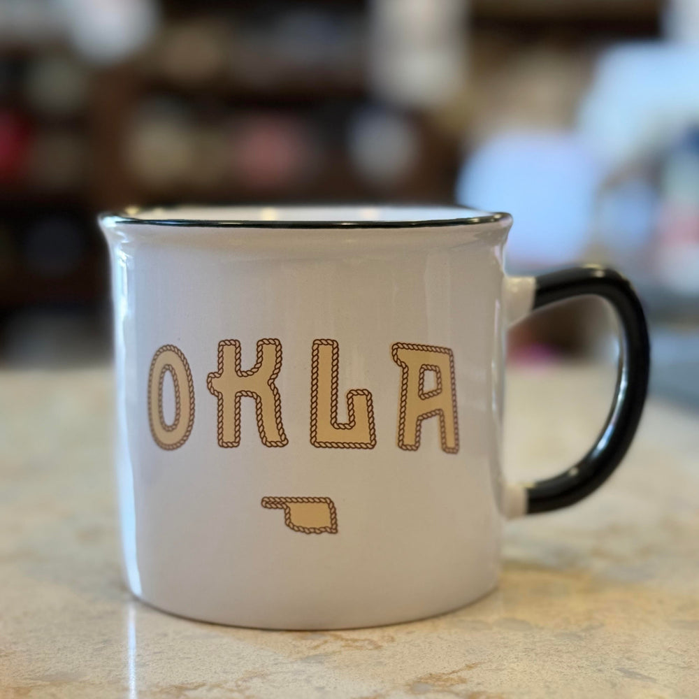 Oklahoma souvenir mug with state outline and rope design