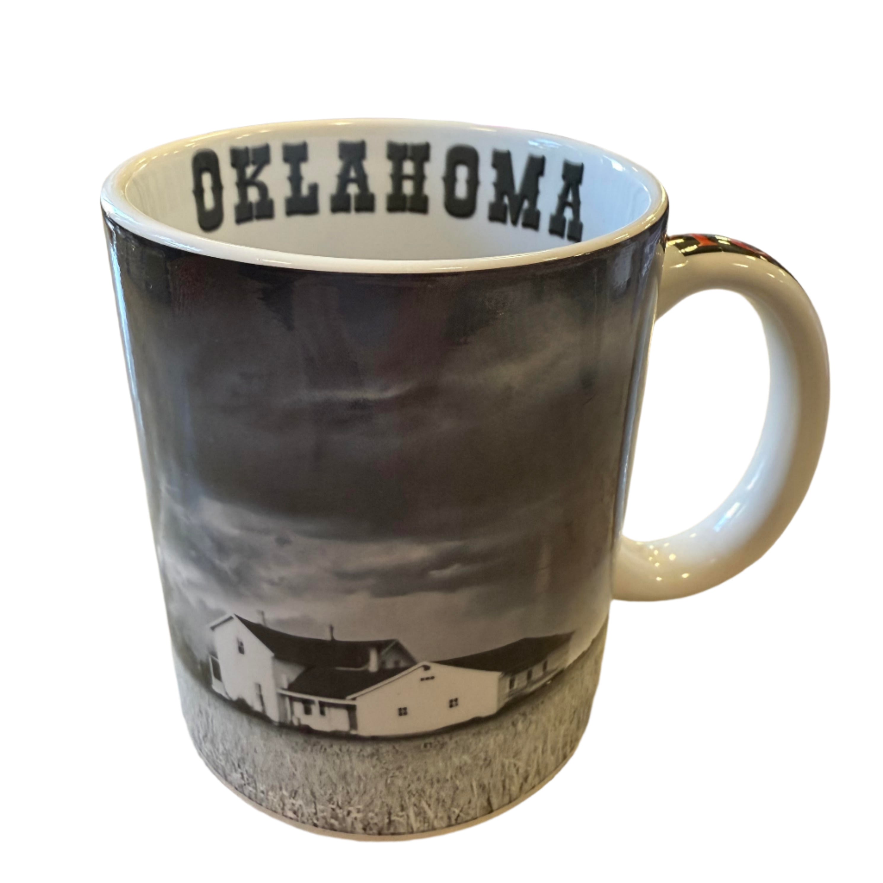Full wraparound Oklahoma mug featuring black and white image of farmhouse and tornado