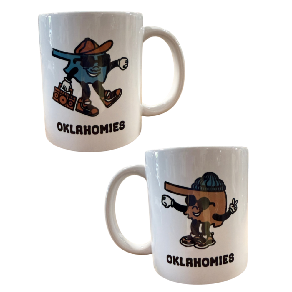 Oklahomies coffee mug with cartoon Oklahoma characters wearing hats and sunglasses fist bumping – funny state pride gift