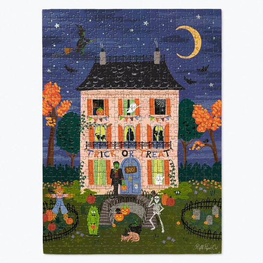 A completed jigsaw puzzle featuring a whimsical Halloween illustration of a haunted house, moon, bats, pumpkins, skeletons, and ghosts in a dark blue night sky.