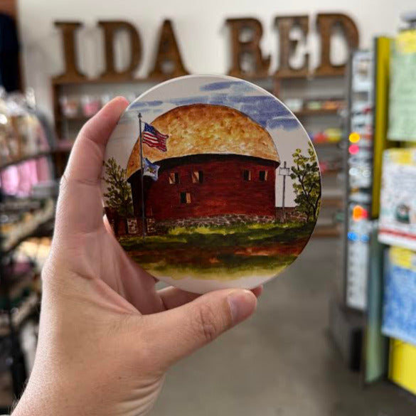 Coaster featuring the historic Round Barn in Arcadia, Oklahoma — a Route 66 roadside icon