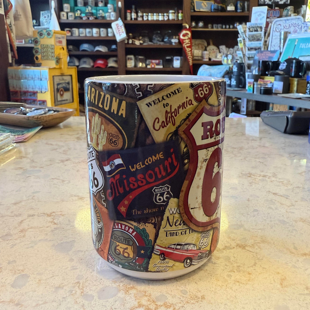 Side view of Route 66 shield mug with retro collage of iconic posters from the historic highway