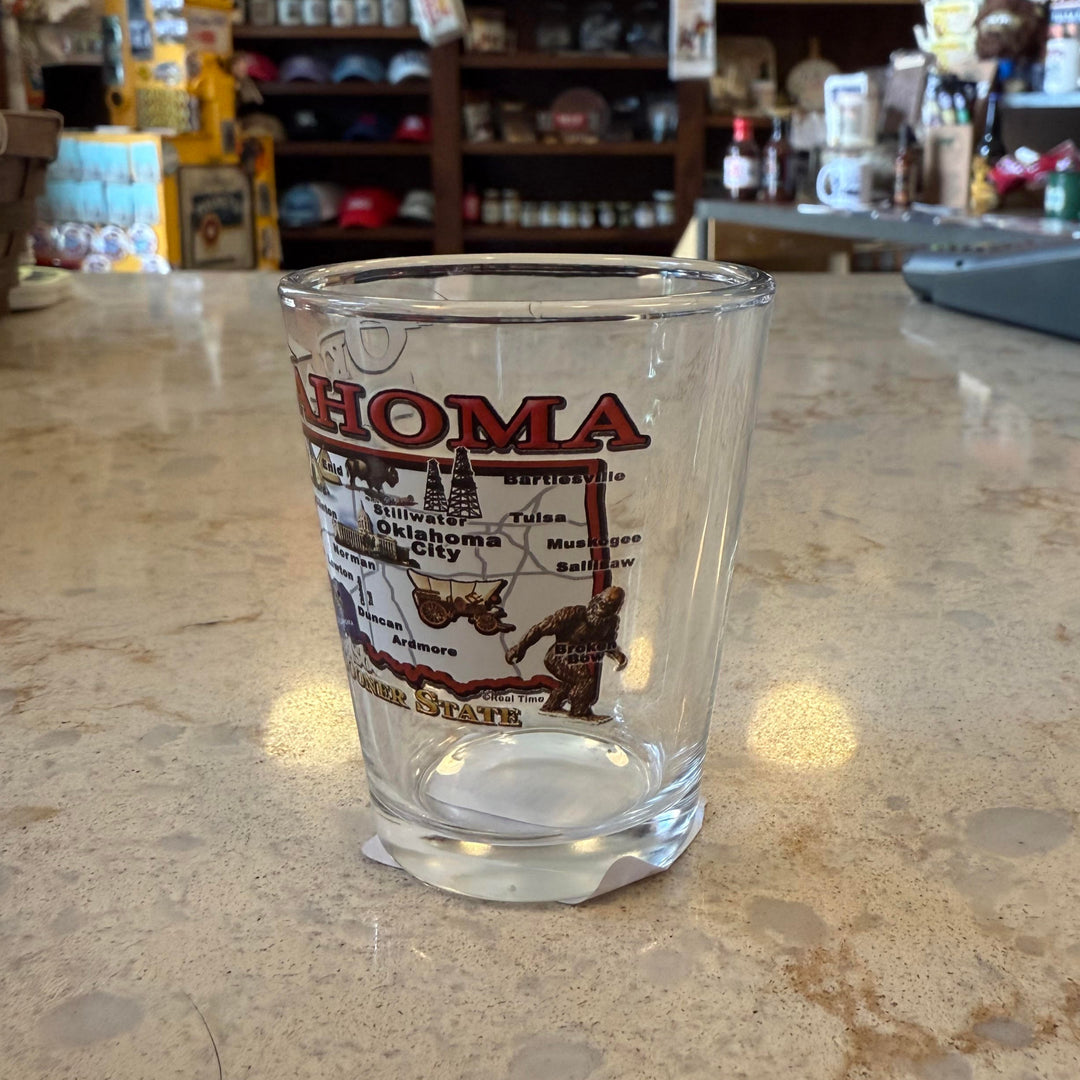 Souvenir shot glass with Oklahoma map and state nickname – clear glass collectible from the Sooner State