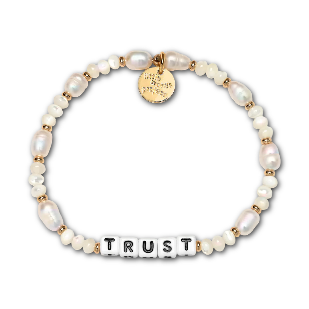 Bracelet featuring pearl beads and letter beads spelling out "TRUST".
