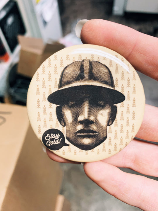 Golden Driller “Stay Gold” round magnet, collectible fridge or locker accessory for Tulsa fans
