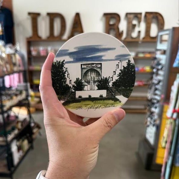 Tulsa-themed coaster with illustration of the Spotlight Theater, a historic performing arts venue